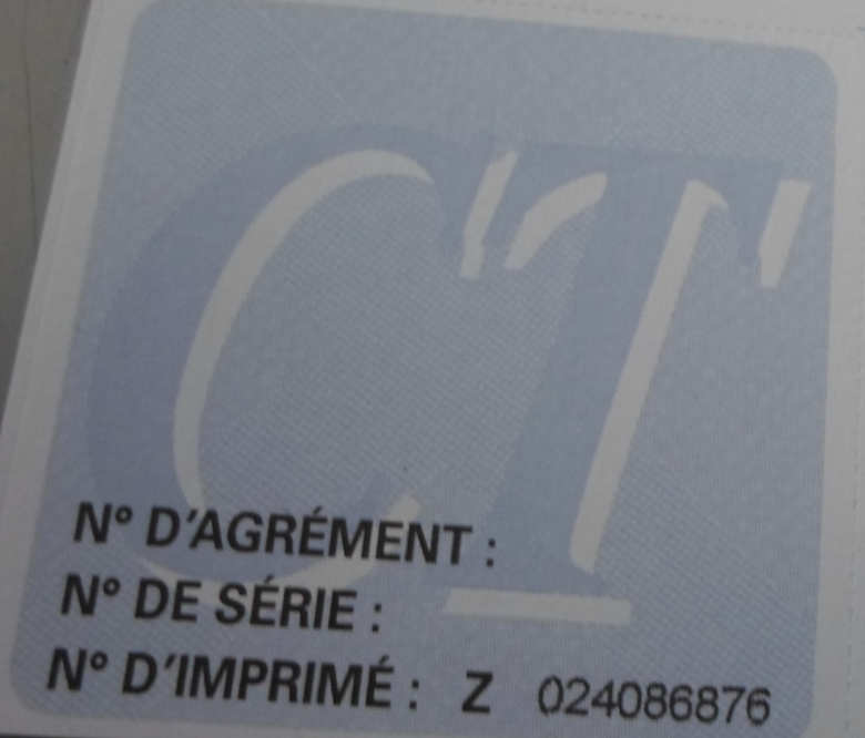 vignette apposé au pare brise